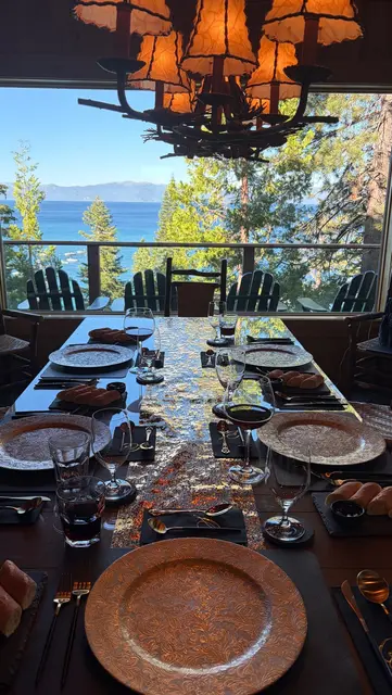 Formal private dining table overlooking a lake